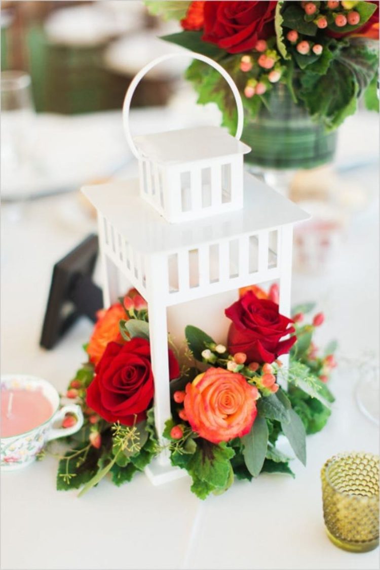 Borrby lantern by IKEA is turned into a chic and romantic wedding centerpiece with blooms