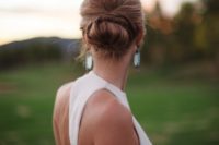 12 a low twisted chignon hairstyle with a messy feel for an elegant but not too preppy look