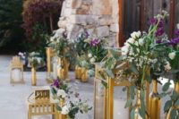 14 decorate the ceremony space with Borrby lanterns with candles and bottles with blooms