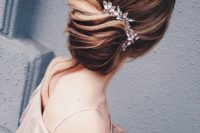 low updo hairstyle for a mother of the groom