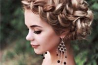 18 a lose fishtail braided updo with a halo is a chic and cool option for a romantic bride
