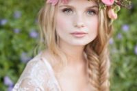 18 a lush and chic pink floral crown with greenery for a spring or summer bride