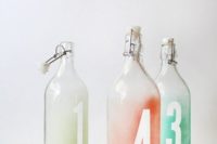20 Korken glass bottles are used to make trendy ombre table numbers