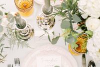 20 a neutral table setting done with touches of grey and mustard plus fresh greenery