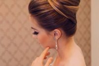 22 an elegant tight top knot with twists and a bump is always a good idea if you have long hair