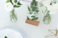 24 Ikea KARLSNAS frame is used to make a minimalist botanical table number for your wedding