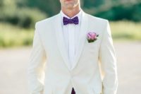 25 a bold printed bow tie and vest like here – purple ones, can be a fresh take on a classic white tux