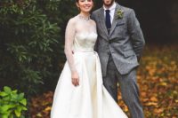 25 a grey two piece tweed wedding suit with a navy tie for a vintage-inspired wedding