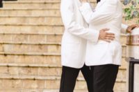26 both grooms wearing white tuxedos and vintage-inspired black and white shoes