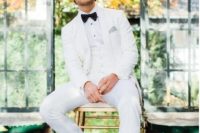a catchy groom’s outfit with a white suit, a white shirt with black buttons, a black bow tie and shoes