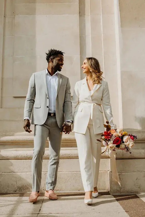 a modern groom's outfit with a grey pantsuit, a white shirt, a brown belt and peachy loafers is a lovely idea for spring or summer