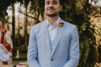 a pretty groom’s look with a pale blue three-piece suit, a white shirt, a bold boutonniere is amazing for spring or summer