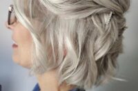 a simple and elegant half updo with rhinestone hairpins and waves is a cool idea for short and medium hair, it’s stylish and effortless