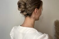 a twisted and curled French twist updo with a wavy dimensional top and some waves down is a cool idea for long hair