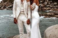 a white tropical groom’s look with a linen suit, a shirt, brown loafers is great for any tropical wedding
