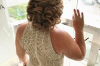 an elegant curled half updo with a dimensional top is always a good idea if you have medium or long hair
