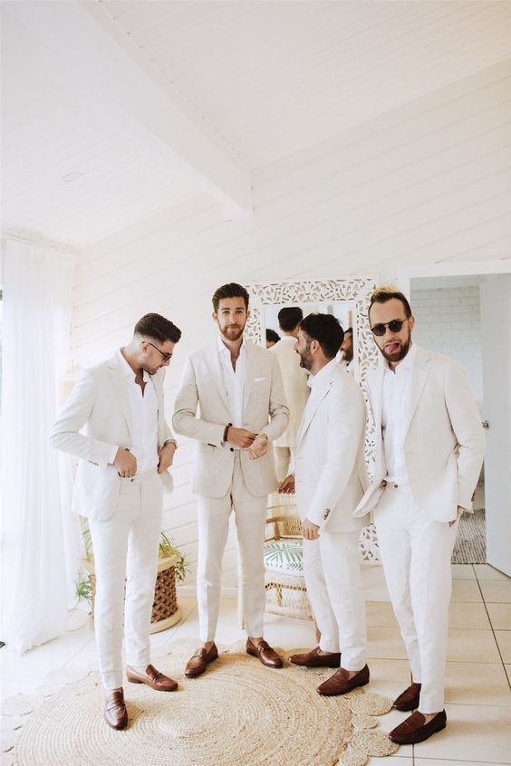 beautiful tropical wedding looks with white pantsuits, white shirts and brown loafers are great for summer
