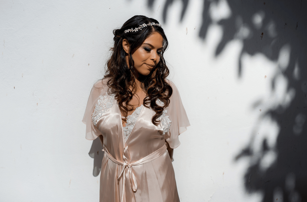 The bride was wearing waves down and an embellished hair vine
