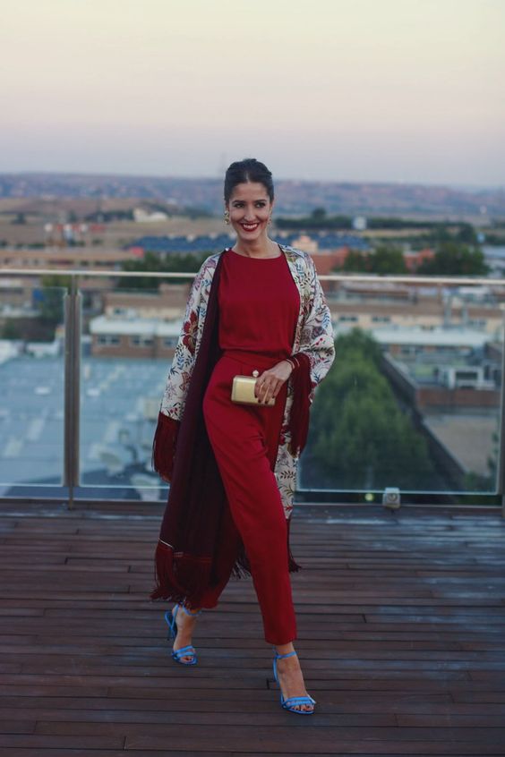 a red jumpsuit, a floral Kimono, a gold clutch and blue shoes for a super chic look