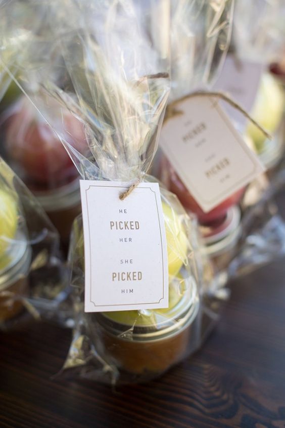 apple jam in a jar and an apple on top is a great idea for a fall wedding favor