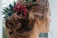 03 The first bridal hairstyle was done with blooms and greenery and some loose waves