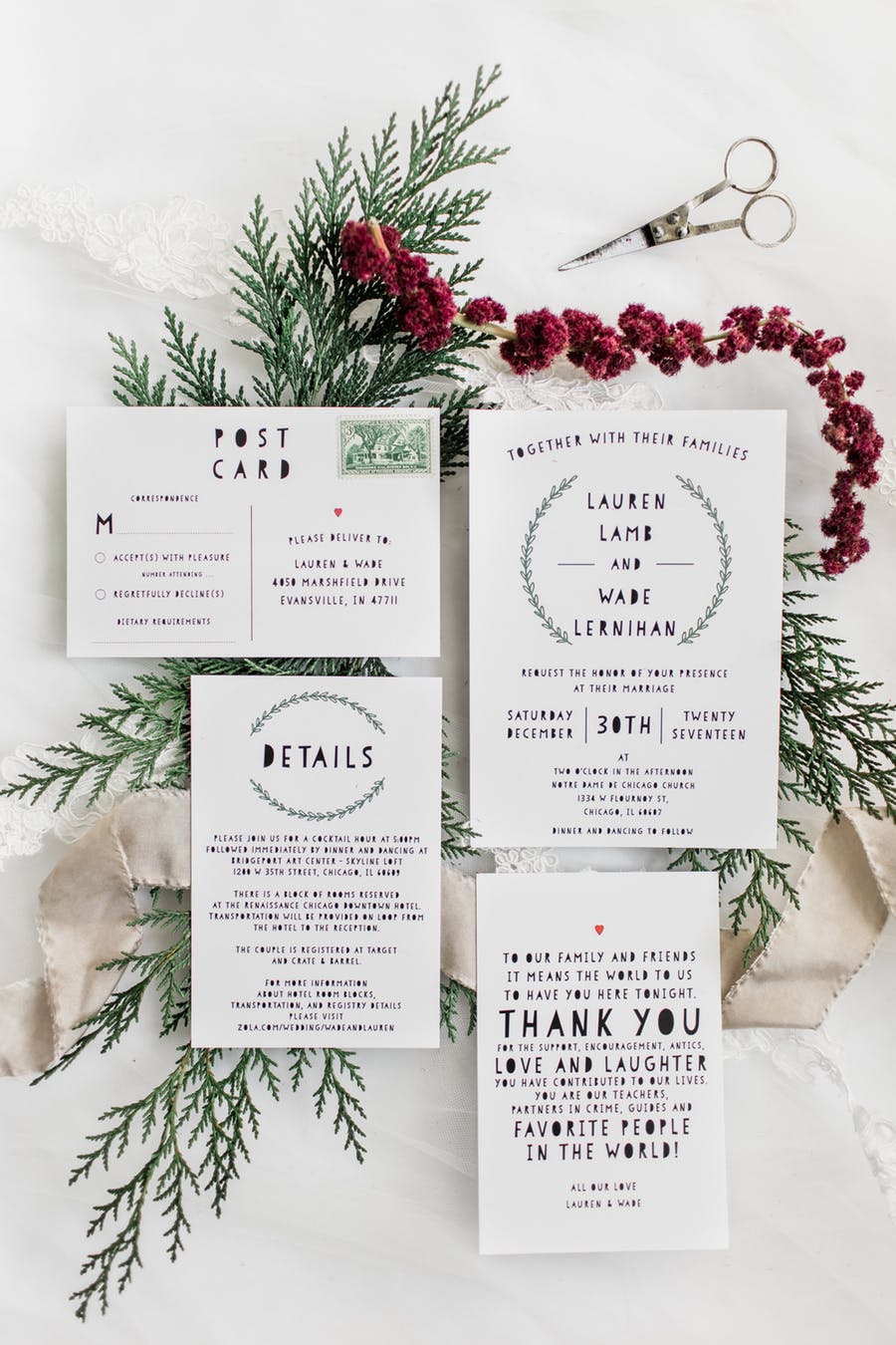 The wedding invitation suite was done in black and white with touches of greenery