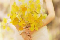09 a yellow leaf wedding bouquet is a fresh take on traditional blooms for the bride