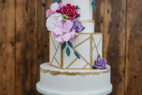 The wedding cake was a wow piece with gilded touches and sugar flowers plus some geometry