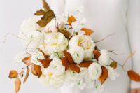 10 a neutral bridal bouquet with some herbs and rust-colored leaves for a contrast