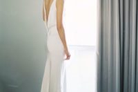 12 a modern slip wedding gown with a plunging back and a small train for a super elegant look