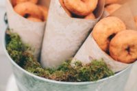 12 fall spiced donuts in kraft paper cones with lace is a great idea for a fall wedding