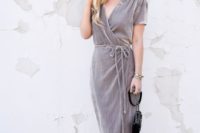 14 a grey velvet midi wrap dress with short sleeves, nude shoes and a black bag for a neutral look