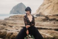 14 a refined black wedding dress with a lace long-sleeved bodice with a V-neckline and a layered tulle skirt