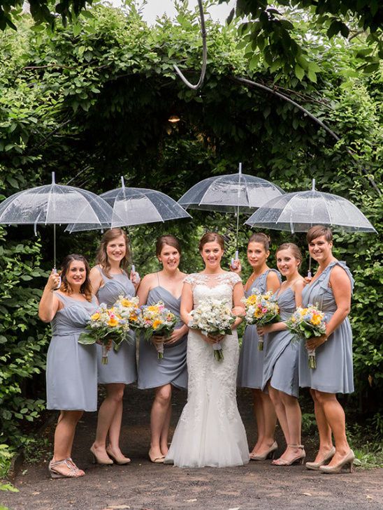sheer umbrellas always work for any wedding and any outfits, they are a perfect fit
