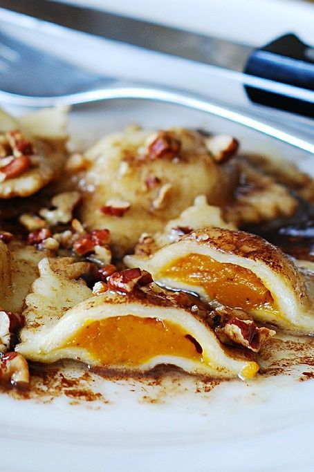 pumpkin ravioli with brown butter sauce and pecans is a tasty and warming idea for fall