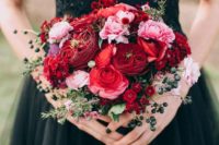 26 a super colorful wedding bouquet with red and pink blooms, greenery and berries