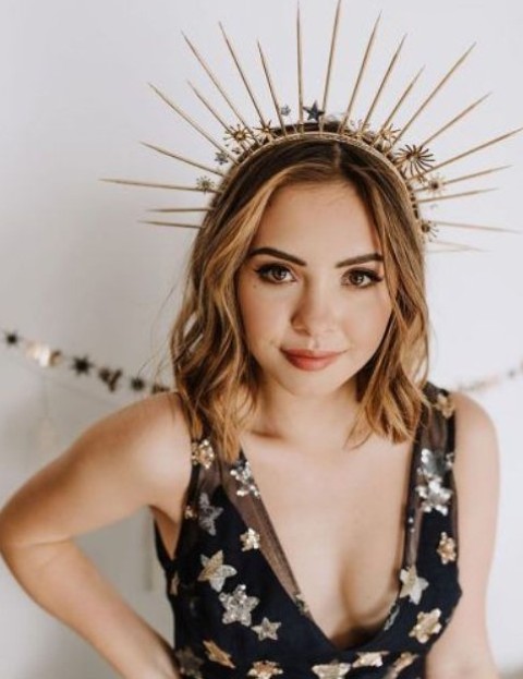 a beautiful spike wedding crown with little stars and suns is a fantastic accessory for a celestial bride