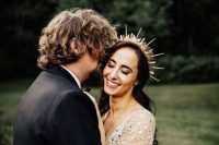 a chic spiked bridal tiara with crystals and metallic touches for an ultra-modern and super bold bridal look