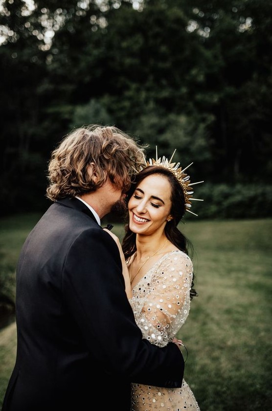 a chic spiked bridal tiara with crystals and metallic touches for an ultra-modern and super bold bridal look