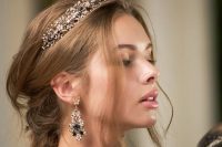 a fab embellished bridal tiara with navy crystals and matching earrings for a chic and refined bridal look