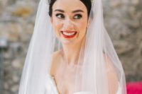 a gorgeous tiara-inspired headband with a long veil attached for a fashion-forward bride