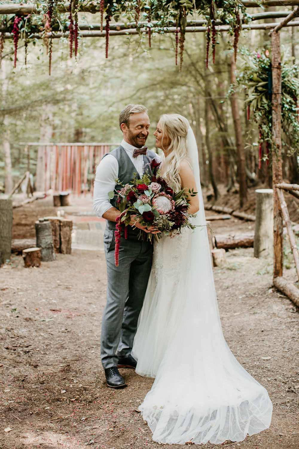 This beautiful couple DIYed their whole wedding in the woods personalizing every single detail