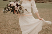 02 The bride was wearign a lace sheath boho dress with an illusion neckline