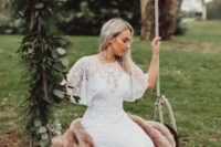 02 The bride was wearing a slip underdress, a lace applique overdress and a faux fur coverup