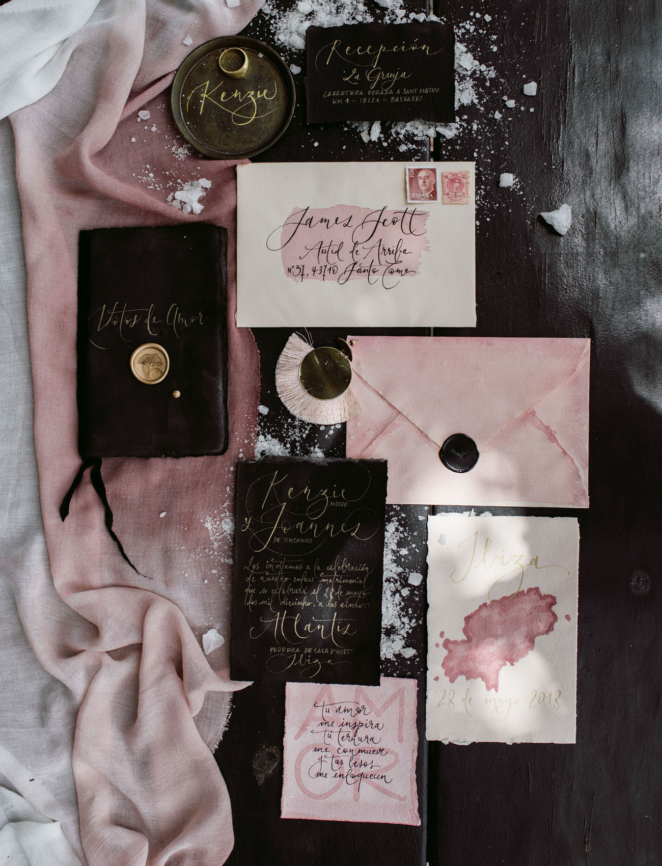 The wedding invitation suite was done in black and pink as the bride's hair is pink