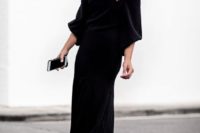 03 a black off the shoulder midi dress with wide sleeves and black heeled sandals