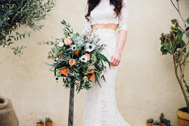 The wedding bouquet was chic and textural, with peachy blooms and lots of greenery