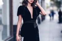 04 a black velver knee wrap dress with a plunging neckline and a tassel sash looks wow