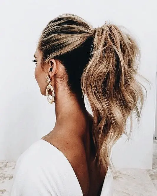 a ponytail with textural locks and a bump on top is a chic casual option