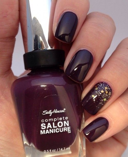 shiny burgundy nails with gold glitter and sequins are a great idea for the fall, highlight the ring finger